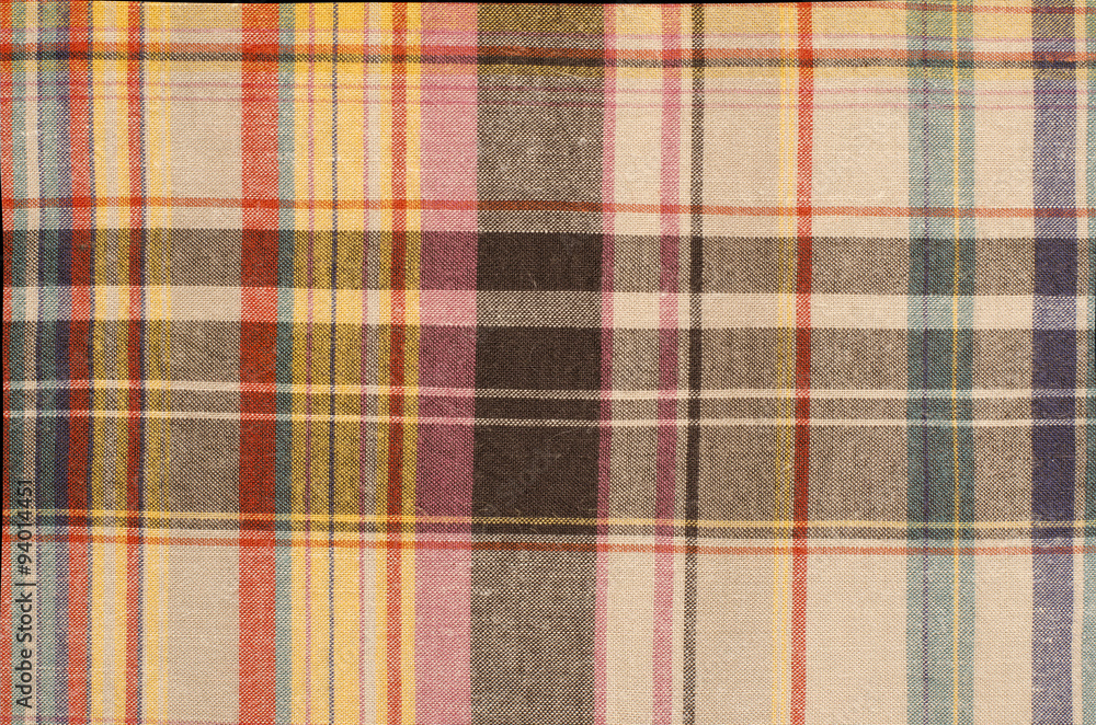 Scottish tartan pattern. Orange and green with yellow plaid print as  background. Colored lines and square pattern. Scottish checked fabric.  Photos | Adobe Stock