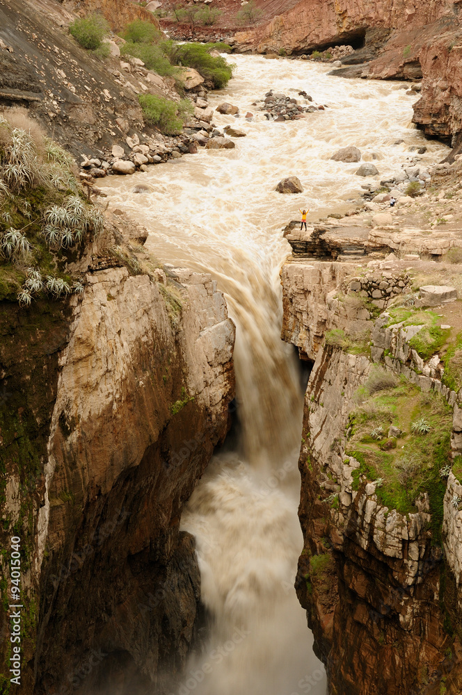 Peru.  Waterfall Sipia on the bottom of the canyon Cotahuasi