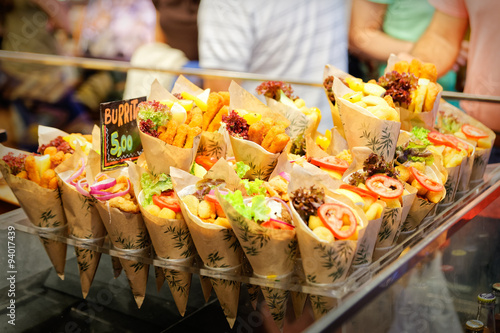 Photography Exposure ordered burrito in paper cones ready for sale to tourists in Barcelona