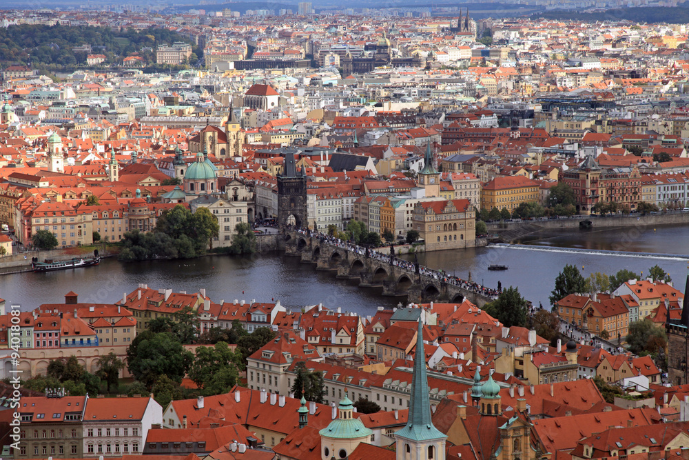 Panorama of Prague Old Town with red roofs and Vltava river