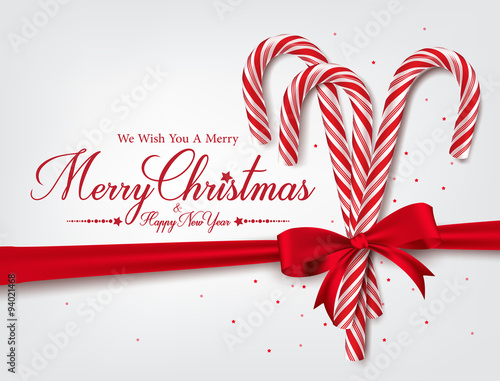 Merry Christmas Greetings in Realistic 3D Candy Cane and Christmas Balls in Background. Vector Illustration
