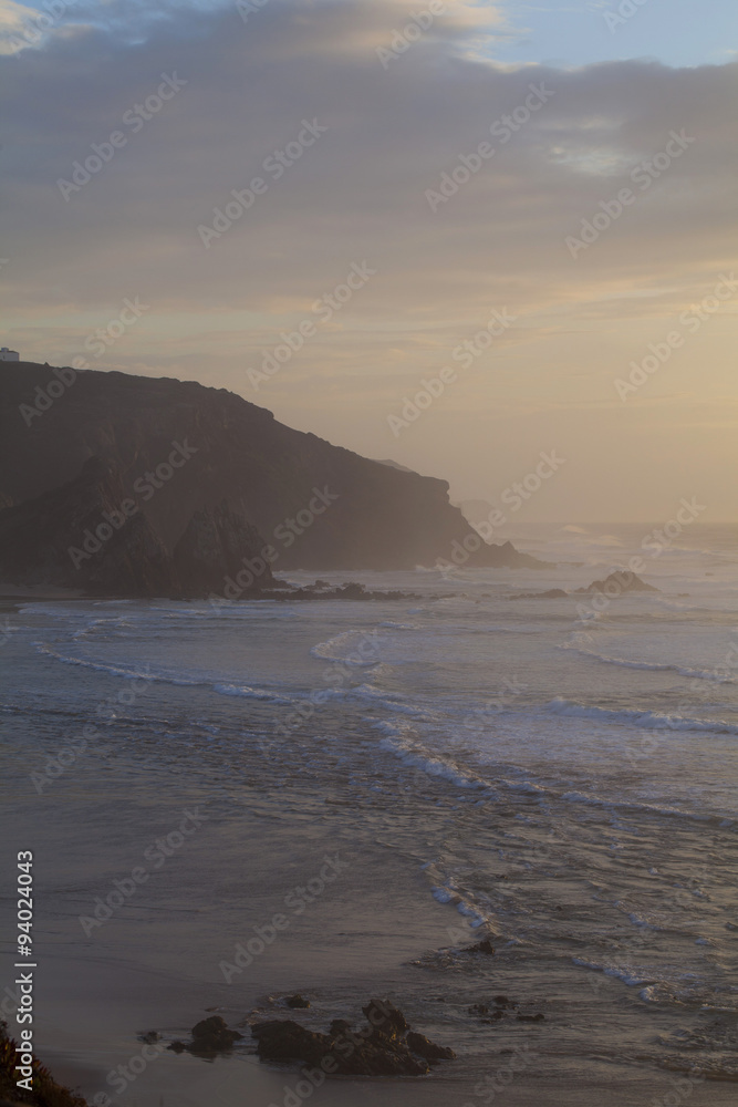 Sunset in wild Atlantic Ocean coast in Portugal. Sunset in wild Atlantic Ocean coast in Portugal.