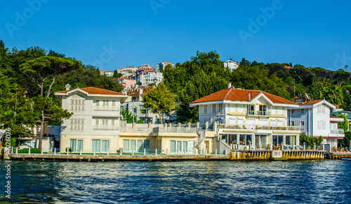 both shores of bosphorus strait are full of residential houses which local people use as weekend residences. photo