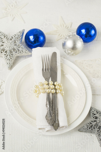 Christmas and New year table place setting with christmas decora