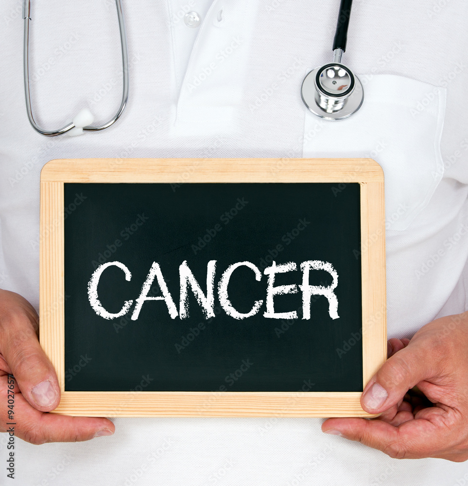 Cancer sign Doctor with chalkboard and text Cancer sign Doctor with chalkboard and text