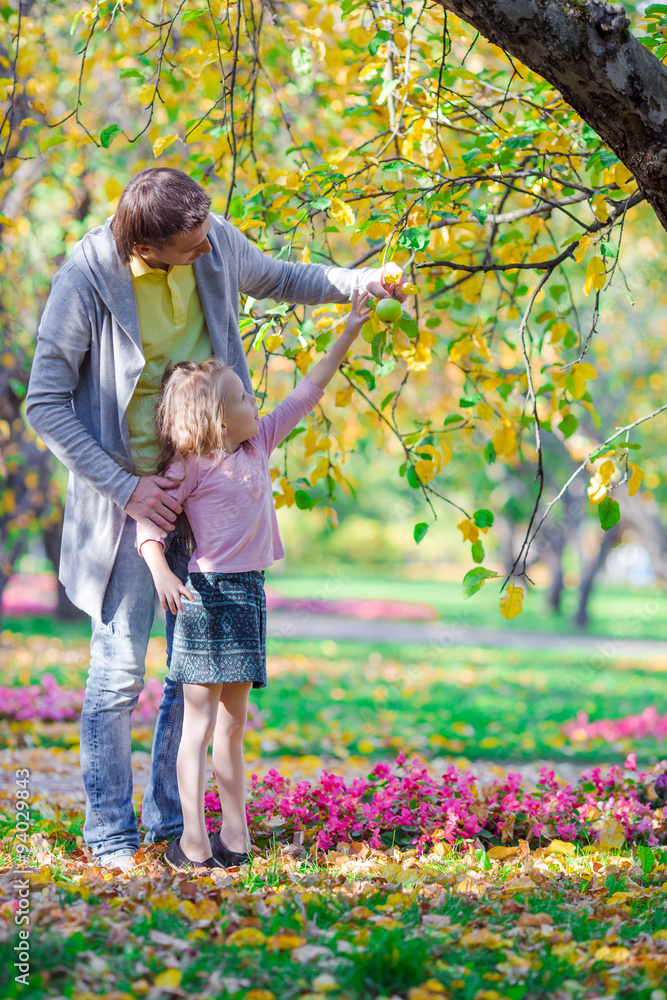 Fototapeta premium Happy family having fun on beautiful autumn day