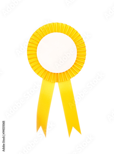 Yellow fabric award ribbon isolated on white background