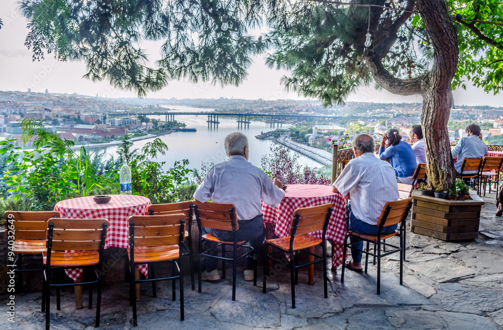 Fototapeta premium People are sitting pierre loti restaurant situated in the middle of graveyard in Istanbul.