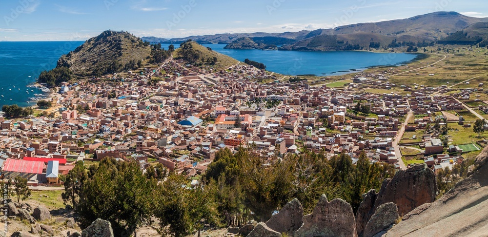 Naklejka premium Aerial view of Copacabana town on the coast of Titicaca lake, Bolivia