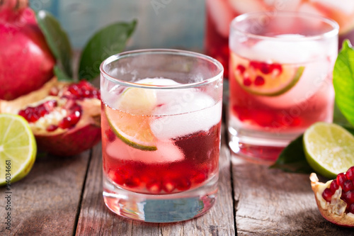 Wallpaper Mural Pomegranate cocktail with lime slices Torontodigital.ca