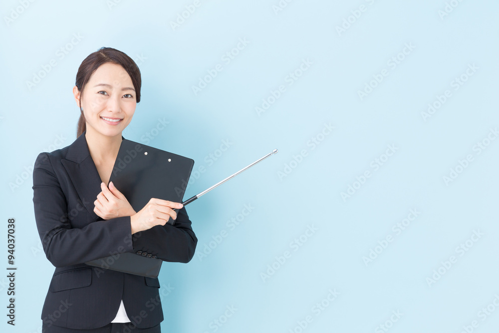 portrait of asian businesswoman on blue background portrait of asian businesswoman on blue background