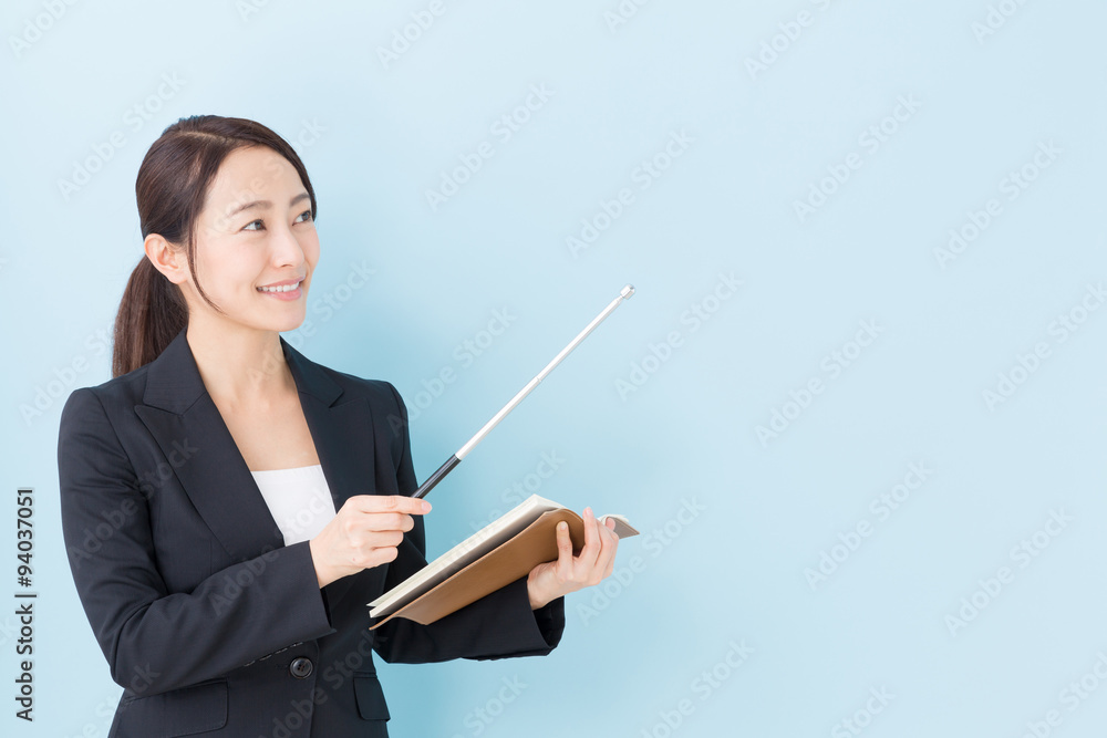 portrait of asian businesswoman on blue background portrait of asian businesswoman on blue background