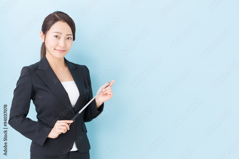 portrait of asian businesswoman on blue background portrait of asian businesswoman on blue background