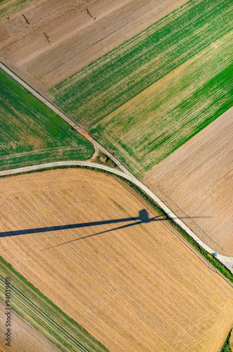 Aerial view on the windmill's shadow