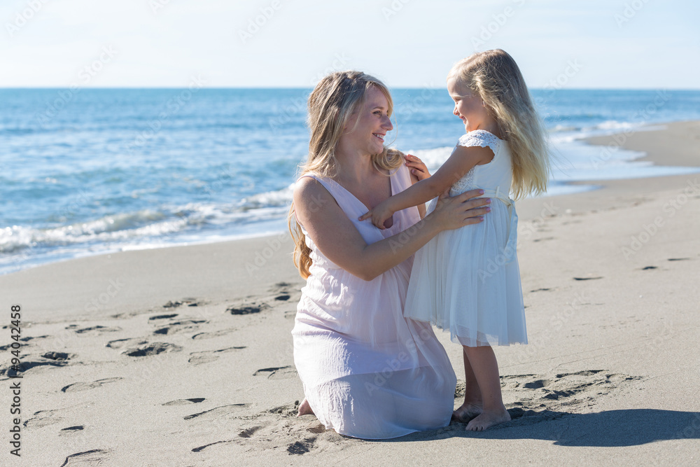 Portrait of a beautiful pregnant woman and daughter 