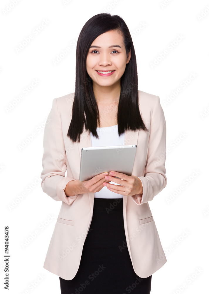 Asian Businesswoman use of the tablet pc Asian Businesswoman use of the tablet pc