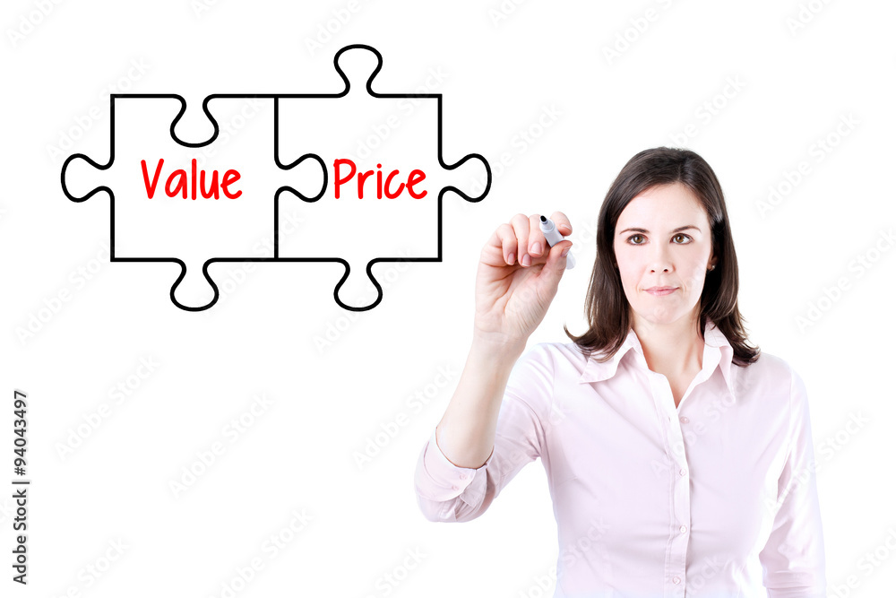 Businesswoman drawing a Value Price puzzle concept on the virtual screen.