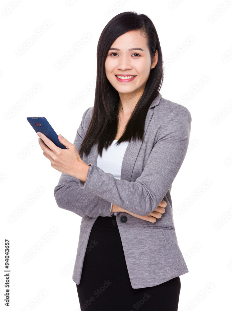 Businesswoman use of the cellphone Businesswoman use of the cellphone