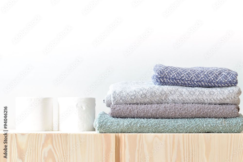 Paper towels and towels on the cupboard at home Paper towels and towels on the cupboard at home
