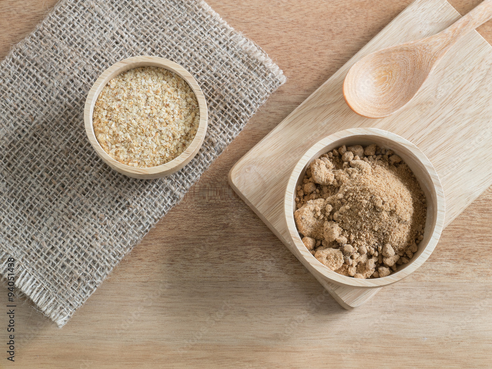 Ingredient grain, wheat germ and Brown sugar in wooden bowl Ingredient grain, wheat germ and Brown sugar in wooden bowl
