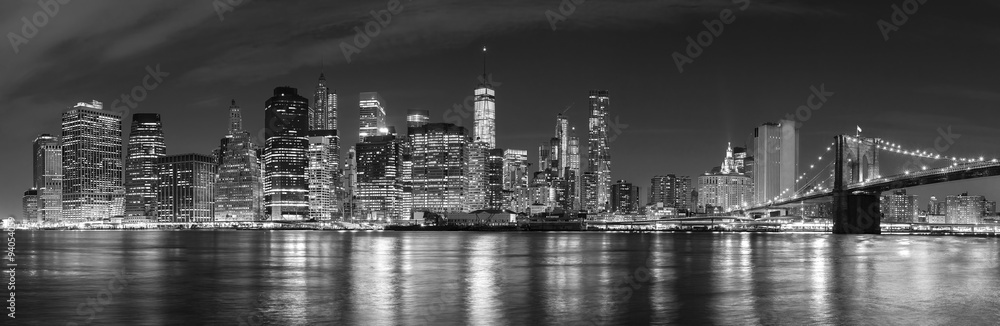 Black and white New York City at night panoramic picture, USA.