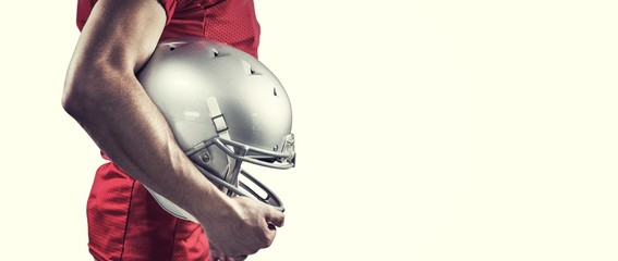 Composite image of american football player with helmet
