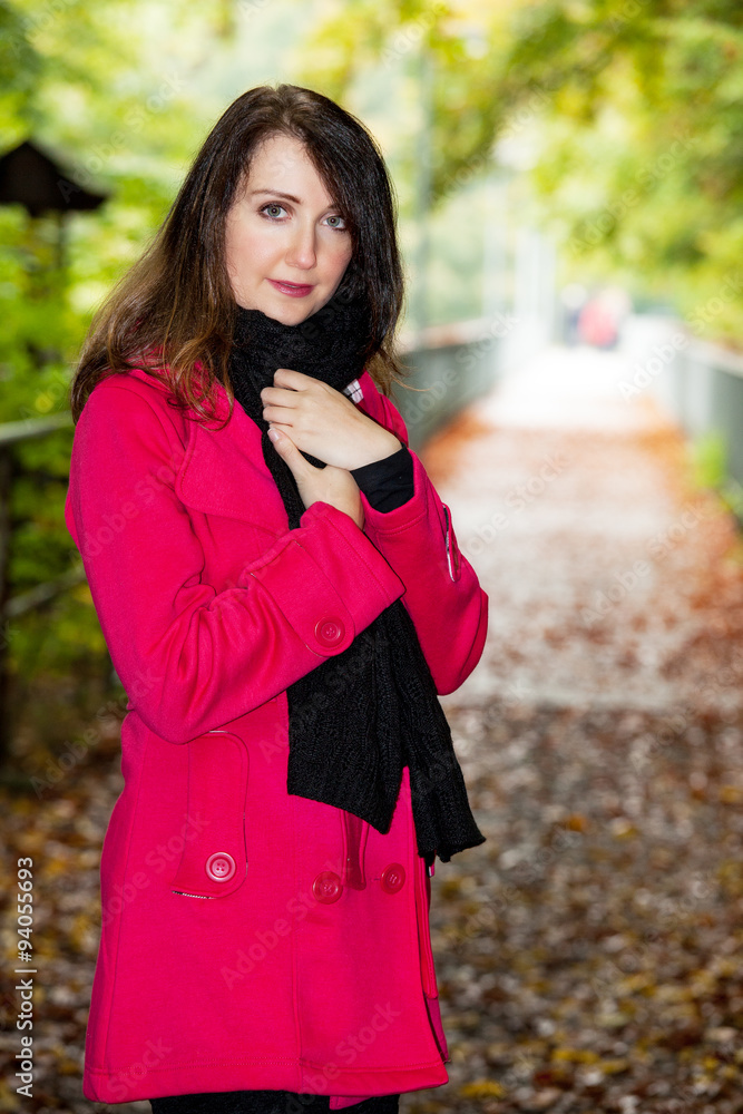 Young woman in autumnal nature