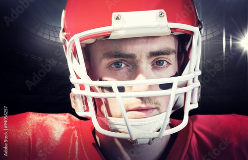 Composite image of american football player wearing helmet