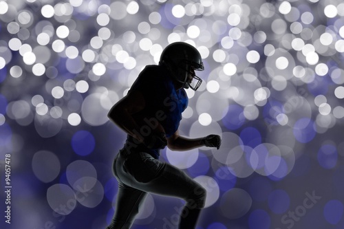 Composite image of silhouette american football player runing