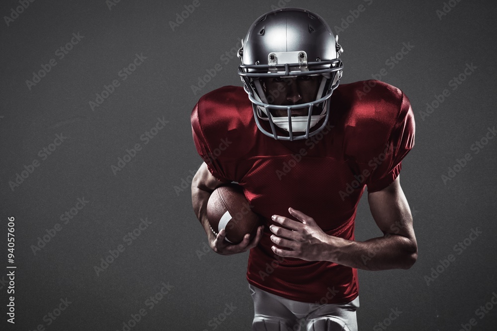Composite image of american football player running with ball