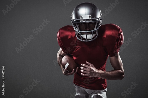 Composite image of american football player running with ball