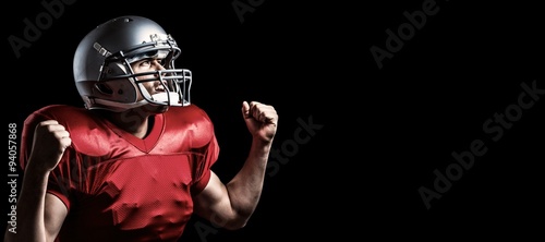 Composite image of american football player cheering