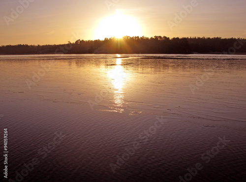 Sunset over lake winter landscape detail  Stockholm  Sweden.