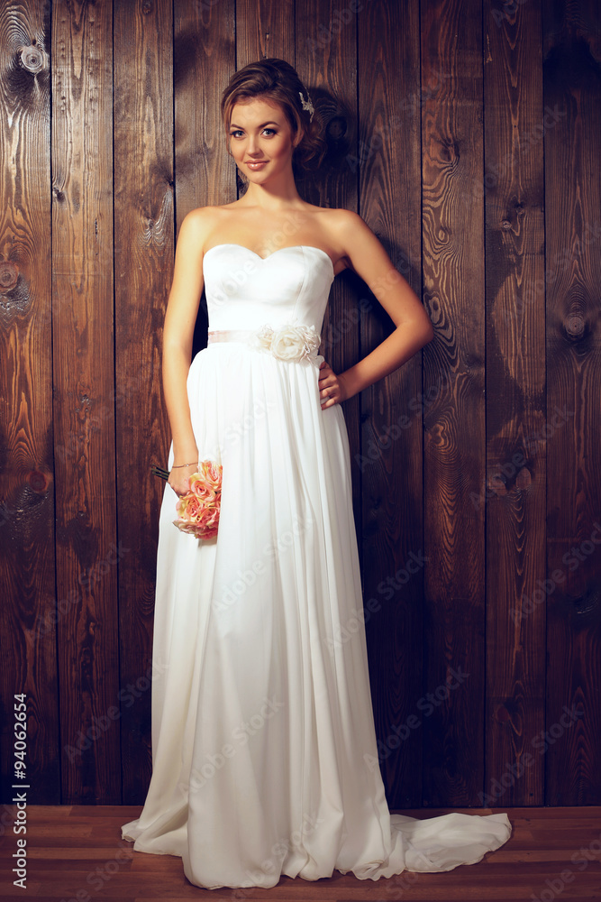 beautiful tender bride in elegant lace wedding dress