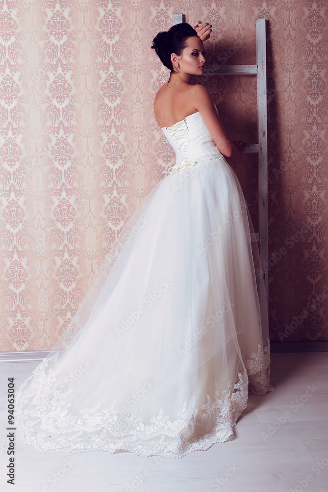 fashion studio photo of beautiful tender bride in elegant lace wedding dress fashion studio photo of beautiful tender bride in elegant lace wedding dress