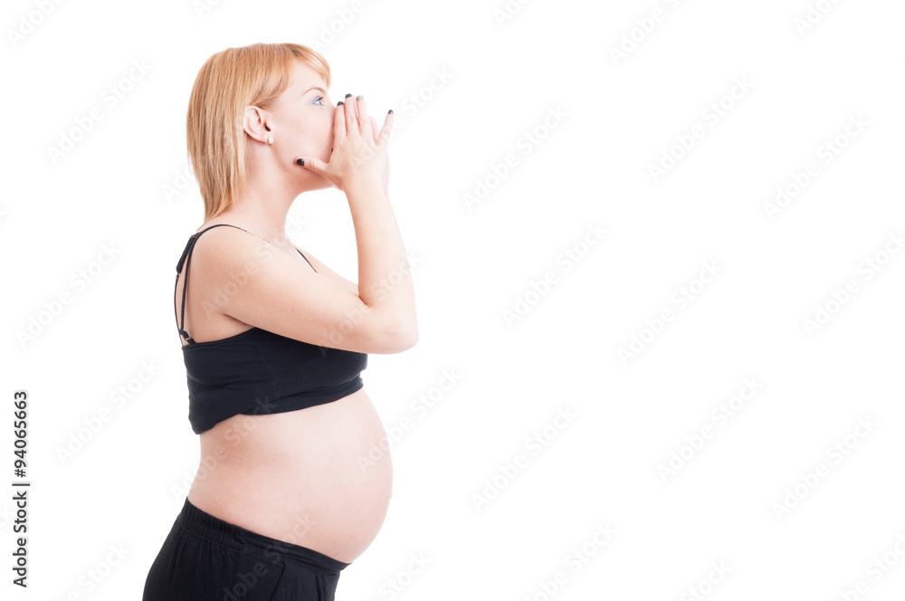 Pregnant woman shouting on blank white copy and advertising spac Pregnant woman shouting on blank white copy and advertising spac