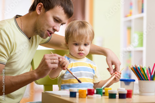 child boy painting in nurse...