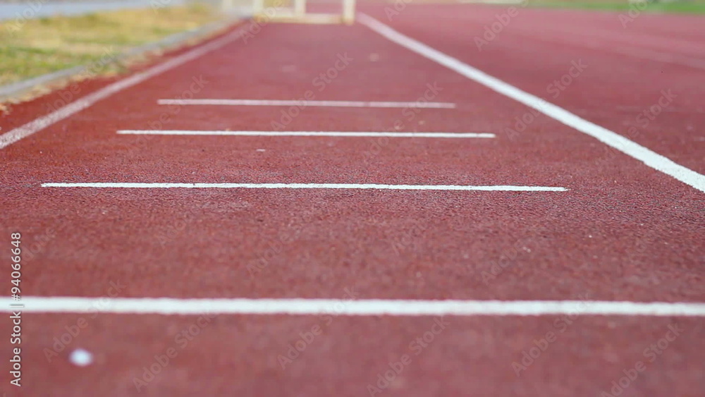 White markings on the red starting treadmill stadium White markings on the red starting treadmill stadium