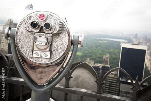 Metal coin operated binoculars overlooking Central Park in Manhattan, New York