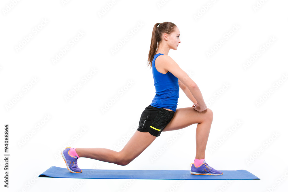 Sports woman doing warm up exercises Sports woman doing warm up exercises