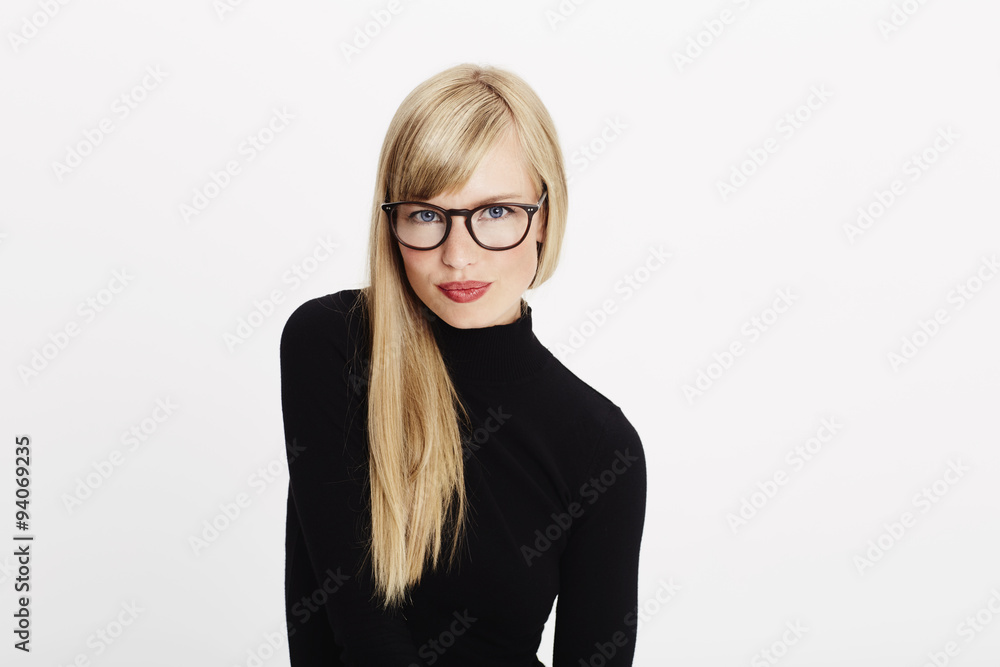 Intelligent young woman in black, portrait