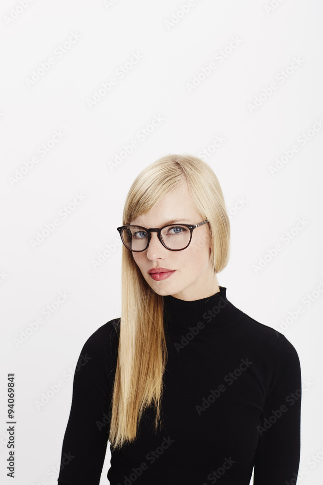 Beautiful woman in black top and spectacles