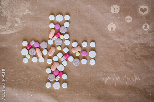 Pills. Health Cross of colored pills and medical icons, graphs, diagrams.