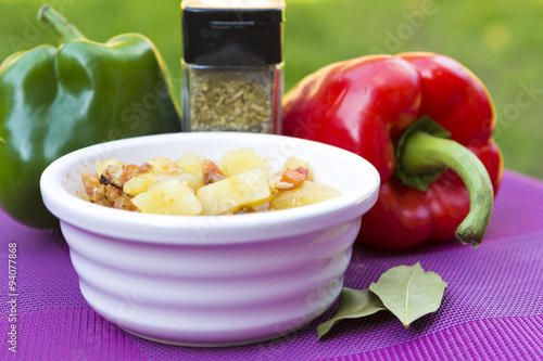 Meat ragout with veggies in bowl photo