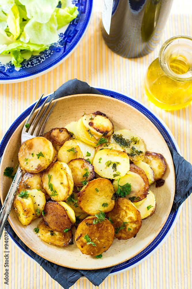 Fried potatoes with goose duck grease and parsley Fried potatoes with goose duck grease and parsley