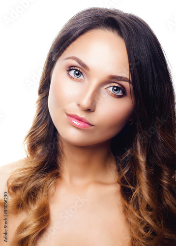 Studio Portrait of Beautiful Model with Long Curly Ombre Hair. Close Up