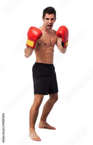 full body young boxer man over white