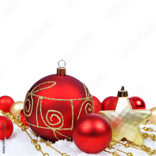 Colorful christmas decoration baubles on white with space for text 
