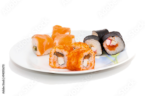  Salmon and caviar rolls isolated on white background
