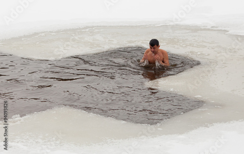 Man in ice cold water